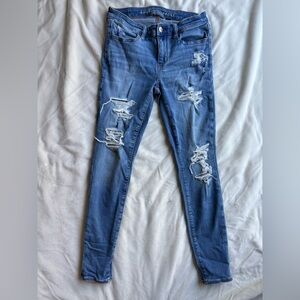 American Eagle Size 2 High Waisted Stretch Patched Ripped Blue Skinny Jeans